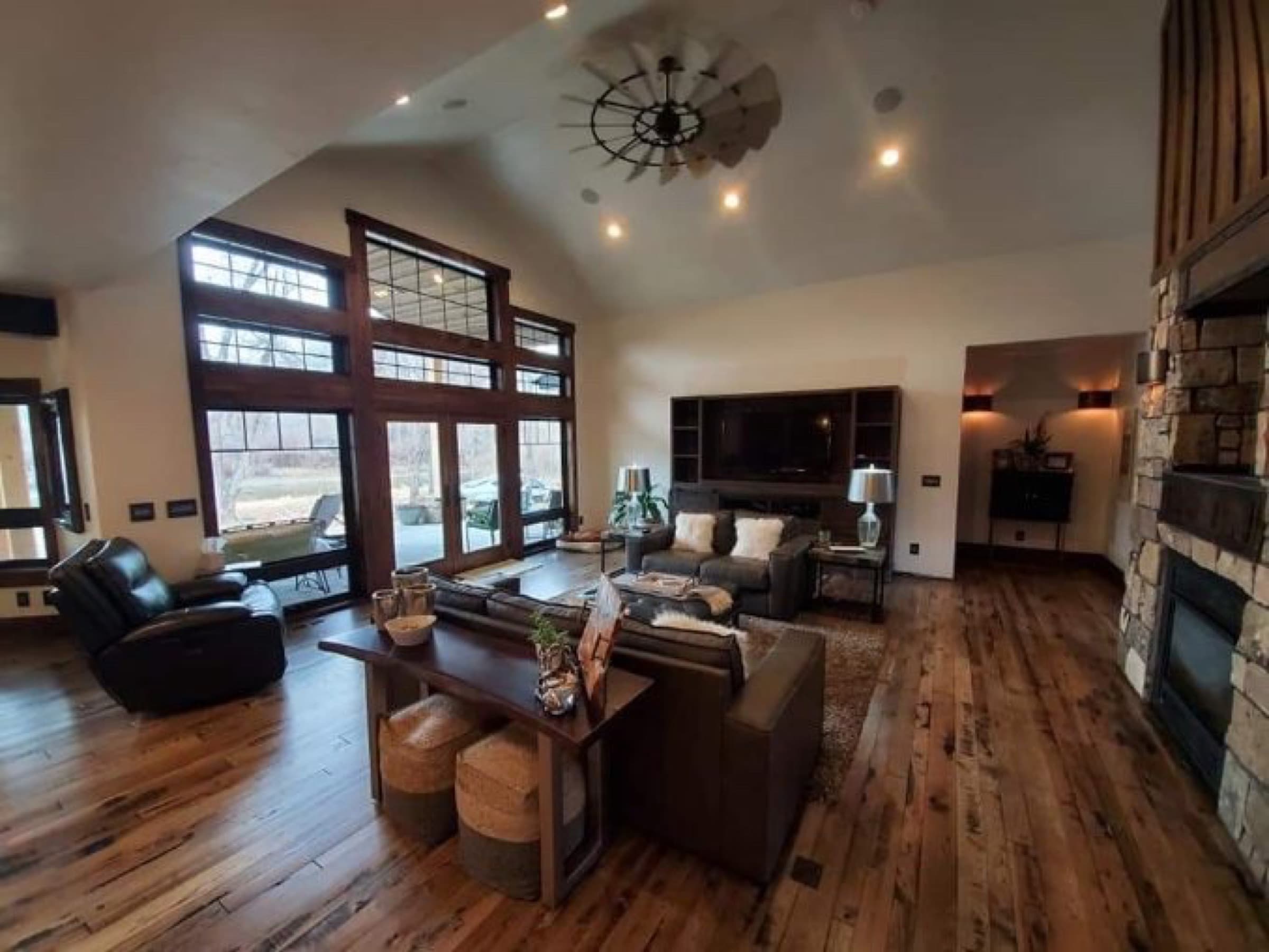 Distressed hickory hardwood floor in a vaulted great room
