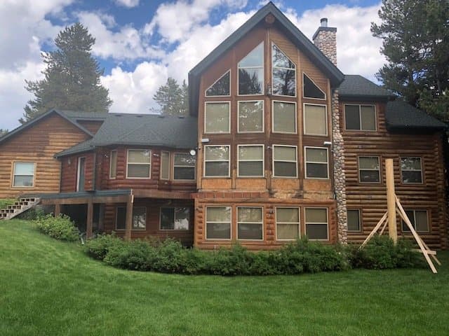 Freshly refinished log home exterior
