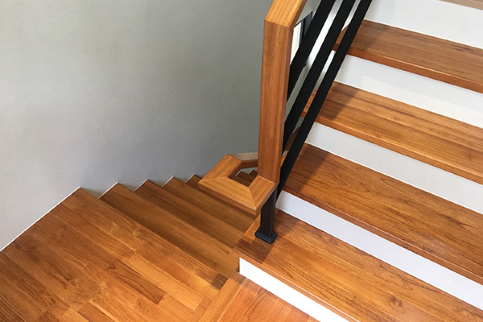 Custom staircase with dark treads and white risers, Pocatello ID