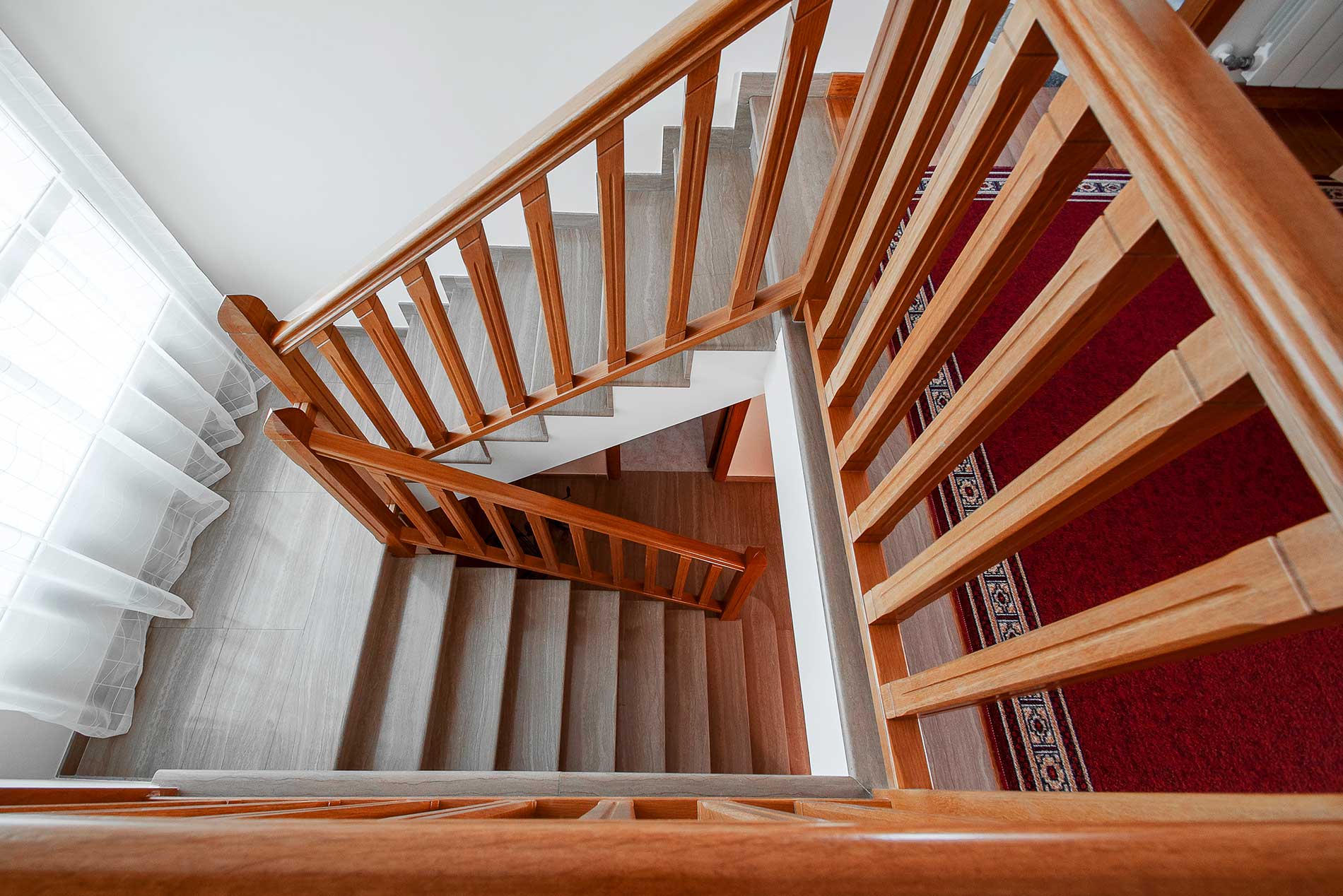 Custom curved wood staircase and railing, Teton WY